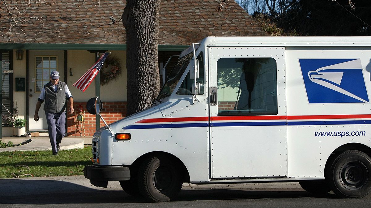 U.S. Postal Service letter carrier Dennis Stecz walks back to his truck after delivering a package Jan. 28, 2009 in San Lorenzo, California. The U.S. Postal Service asked the U.S. Congress for permission to discontinue mail delivery one additional day a week in an effort to make up financial losses. The Postal Service is forecasting a loss of $9 billion in 2009. (Photo by Justin Sullivan/Getty Images) (Justin Sullivan/Getty Images)